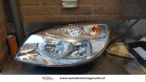 O160785 Gebruikte linker koplamp Renault Grand Scenic