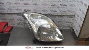 O161034 Gebruikte koplamp rechts Suzuki Swift