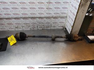 O161612 Gebruikte aandrijfas rechts-voor Nissan Almera