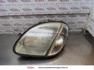 O161940 Gebruikte koplamp links Mercedes SLK