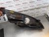 Gebruikte Koplamp links Mitsubishi Colt O162255