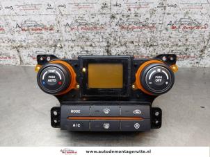 O162662 Gebruikte chaufage bedieningspaneel Kia Carens