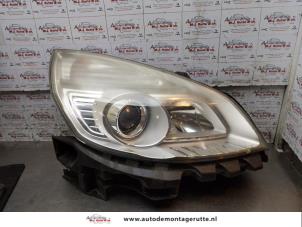 O162833 Gebruikte rechter koplamp Renault Grand Scenic