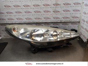 O163113 Gebruikte koplamp rechts Peugeot 207
