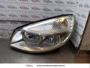 O163125 Gebruikte linker koplamp Renault Grand Scenic