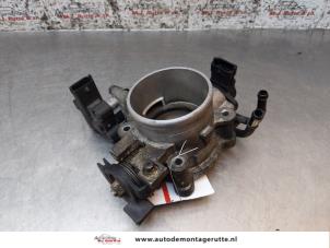 O163214 Gebruikte gasklephuis Kia Carens