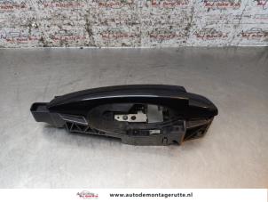 O163250 Gebruikte portiergreep 4deurs rechts-achter Opel Corsa