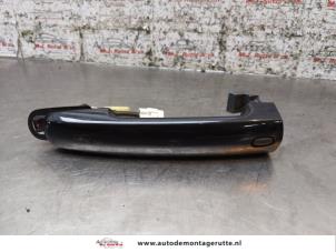 O163292 Gebruikte deurgreep 2deurs links Suzuki Swift