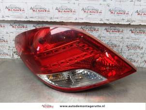 O163297 Gebruikte achterlicht links Peugeot 207