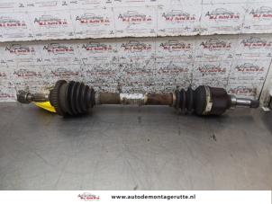O163404 Gebruikte aandrijfas links-voor Peugeot 206