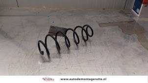 O163599 Gebruikte veerschroef achter Opel Corsa