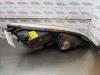Gebruikte Koplamp links Mitsubishi Colt O163744