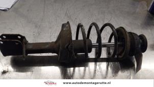 O163845 Gebruikte voorpoot links Renault Clio