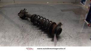 O163910 Gebruikte schokdemperpoot links-voor Suzuki Ignis