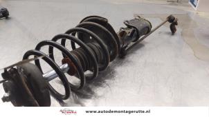 O163938 Gebruikte schokdemperpoot links-voor Volvo V70