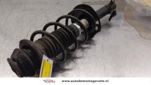 O163941 Gebruikte schokdemperpoot links-voor Citroen C1