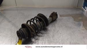 O163958 Gebruikte schokdemperpoot rechts-voor Renault Twingo