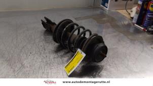 O163976 Gebruikte schokdemperpoot links-voor Renault Twingo