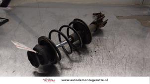 O163978 Gebruikte schokdemperpoot rechts-voor Renault Twingo
