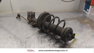 O163996 Gebruikte schokdemperpoot links-voor Peugeot 307