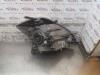 Gebruikte Koplamp links Daihatsu Sirion O164011