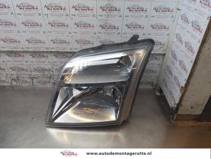 O164050 Gebruikte koplamp links Ford Transit Connect