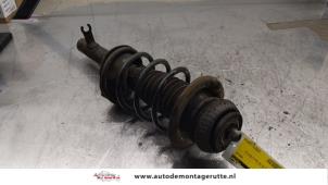 O164144 Gebruikte schokdemperpoot links-voor Ford KA