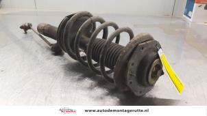 O164260 Gebruikte schokdemperpoot links-voor Peugeot Partner