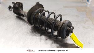 O164308 Gebruikte schokdemperpoot rechts-voor Peugeot 3008