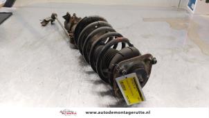 O164310 Gebruikte schokdemperpoot links-voor Volvo XC90