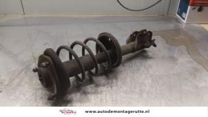 O164409 Gebruikte mac phersonpoot links-voor Mitsubishi Colt