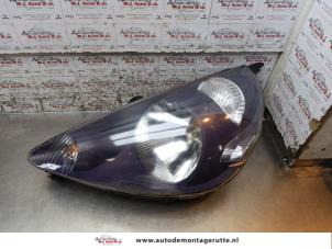O164440 Gebruikte linker koplamp Honda Jazz