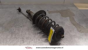 O164468 Gebruikte schokdemperpoot links-voor Peugeot 207