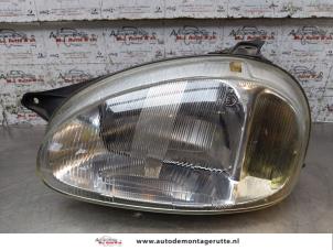 O164599 Gebruikte linker koplamp Opel Corsa