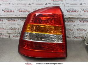 O164735 Gebruikte achterlicht links Opel Astra