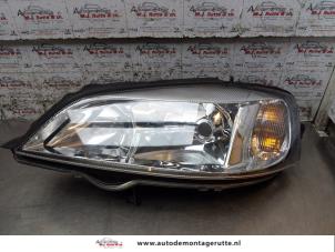O164738 Gebruikte linker koplamp Opel Astra