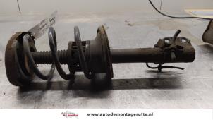 O164917 Gebruikte veerpoot links-voor Renault Megane Scenic