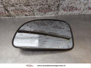 O165122 Gebruikte spiegelglas links Daewoo Tacuma