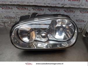O165127 Gebruikte koplamp links Volkswagen Golf
