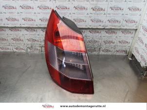 O165450 Gebruikte achterlicht links Renault Megane Scenic