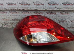 O165640 Gebruikte achterlicht links Peugeot 207