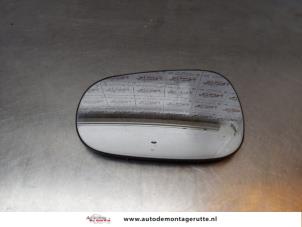 O165644 Gebruikte spiegelglas links Dacia Logan