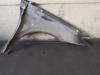 Gebruikte Spatbord links-voor Renault Laguna O165679