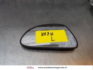 O165739 Gebruikte spiegelglas links Suzuki Alto