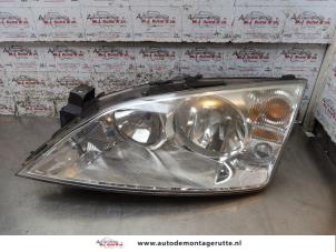 O165802 Gebruikte koplamp links Ford Mondeo
