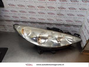 O166000 Gebruikte koplamp rechts Peugeot 207
