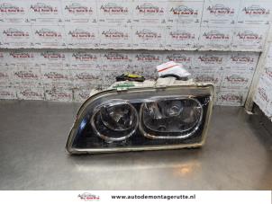 O166032 Gebruikte koplamp links Volvo V40