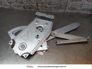 O166099 Gebruikte ruitmechaniek 4deurs links-voor Renault Megane