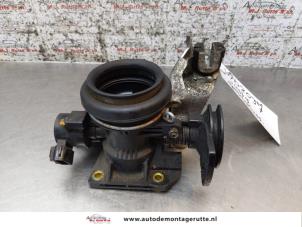 O166228 Gebruikte gasklephuis Subaru Justy