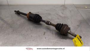 O166205 Gebruikte aandrijfas rechts-voor Nissan Primera